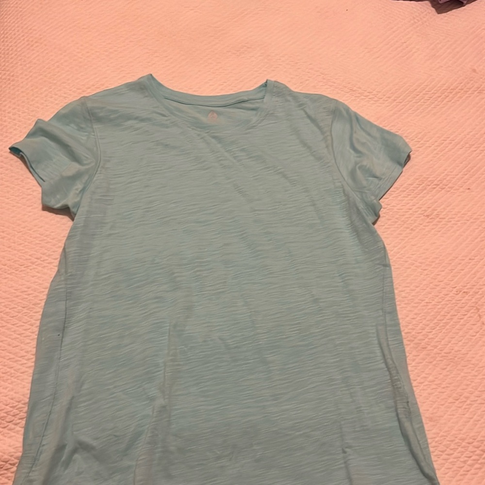Blue cute shirt that has never been worn